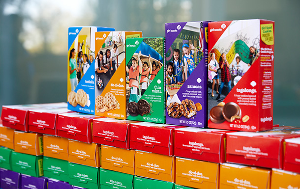 girl scout cookie boxes on display
