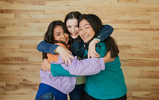 group of girls hugging