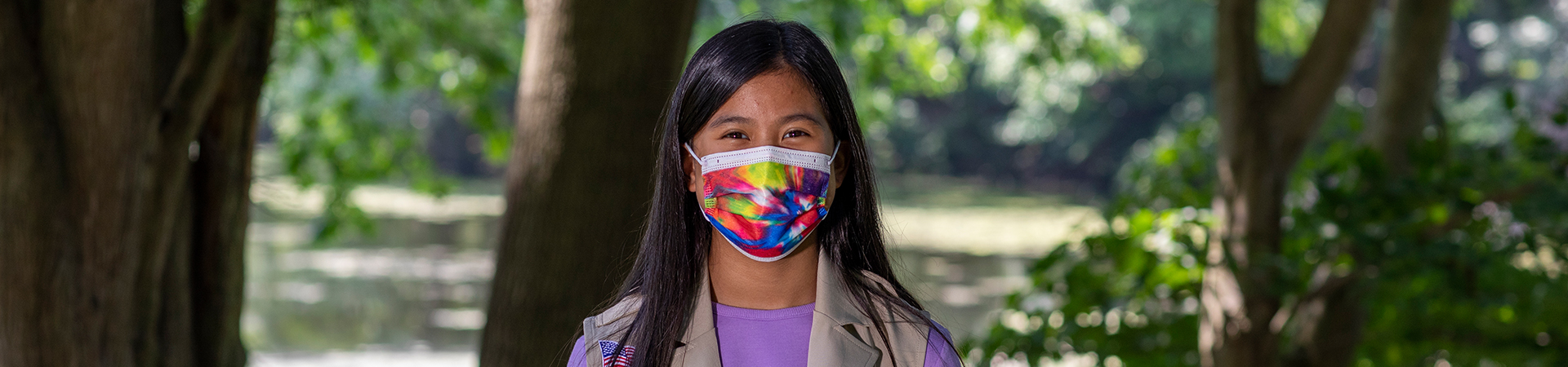  older girl scout wearing mask 