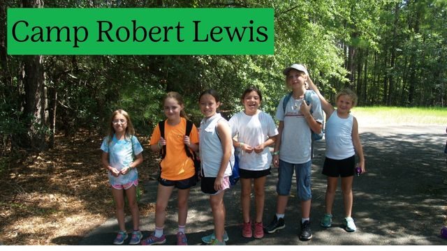 girl scouts exploring camp