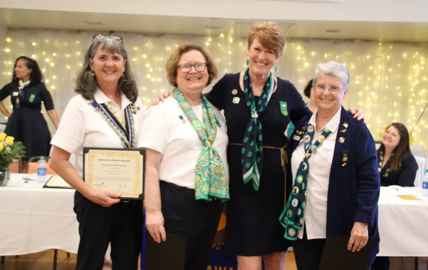 girl scout volunteers at award ceremony