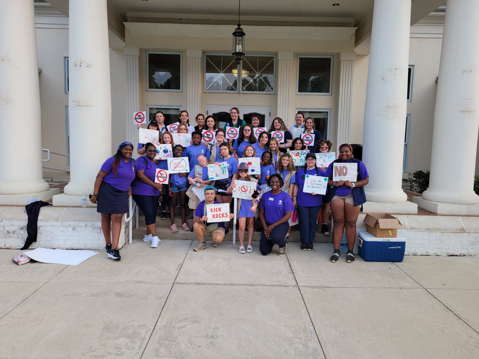 Girl Scout Cadettes and GSHG Staff advocating against the Crawford County rock quarry